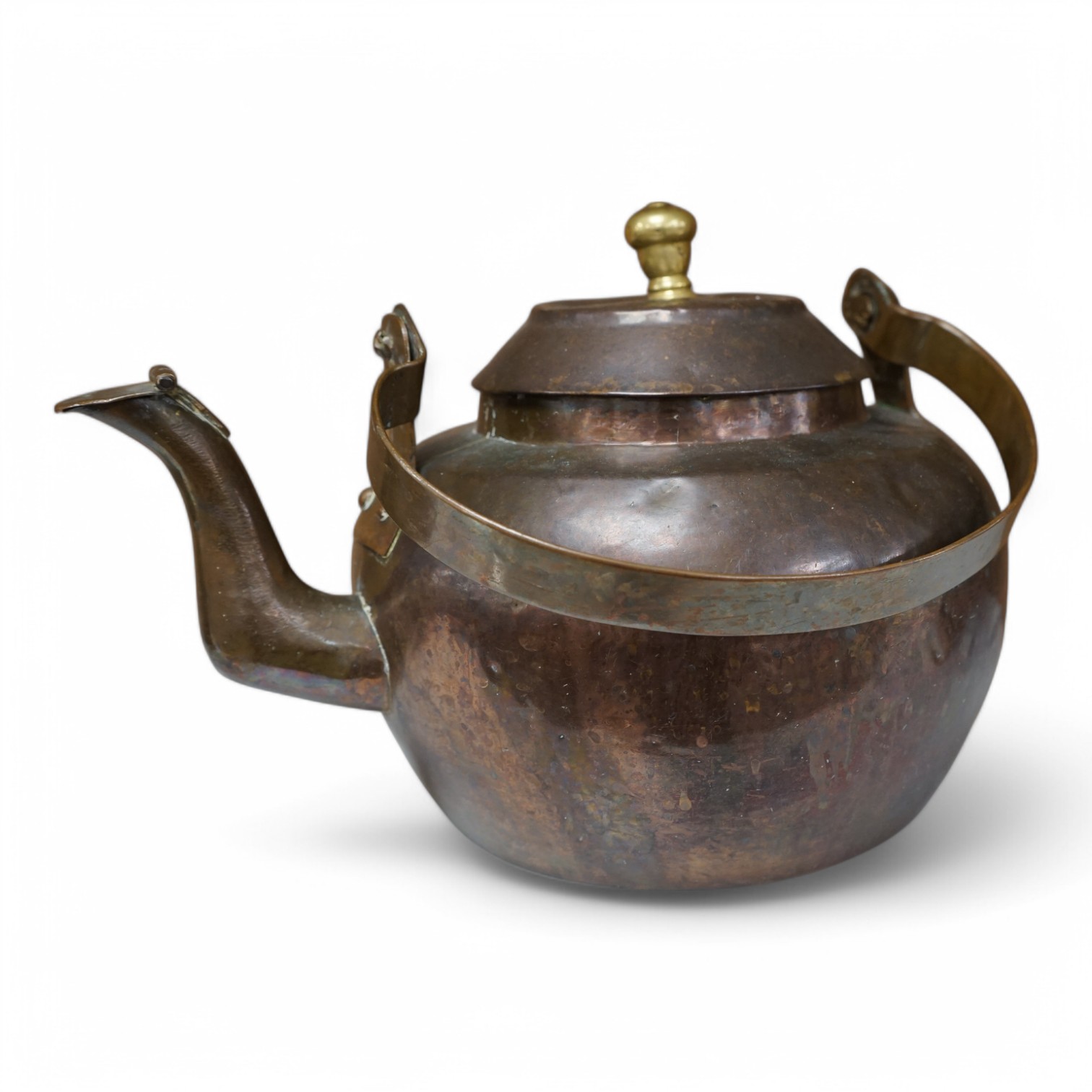 A Dutch copper kettle with brass knop, 34cm wide. Condition - fair